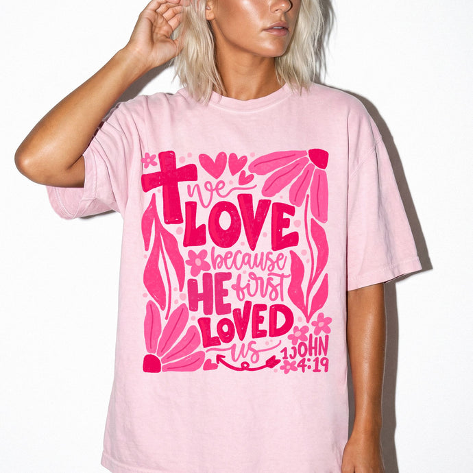 We LOVE Because HE First LOVED Us Floral T-Shirt — Pink Flower Faith Tee